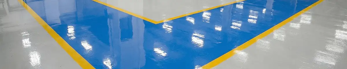 A factory floor professionally covered and marked with epoxy flooring in Rockford, IL
