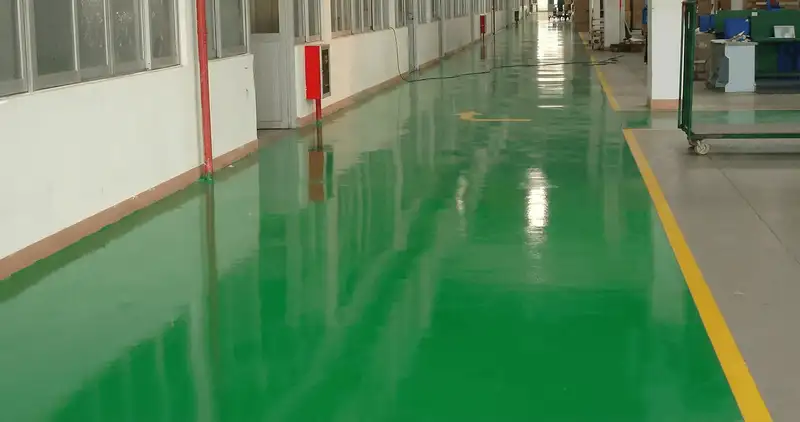 A factory floor professionally covered and marked with epoxy flooring in Rockford, IL