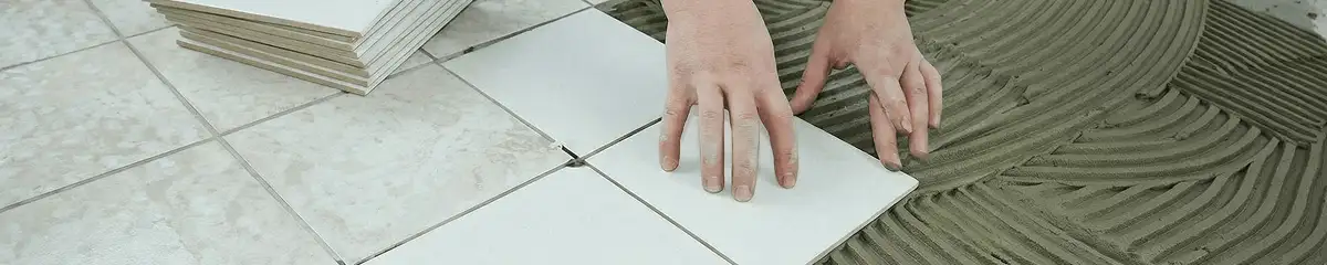 Professional installing white tile floors in Rockford, IL