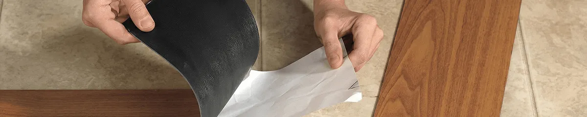 A professional installing vinyl flooring in Rockford, IL