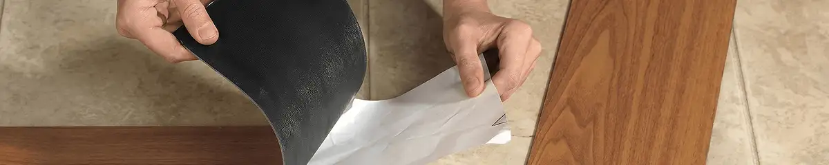 A professional installing vinyl flooring in Rockford, IL