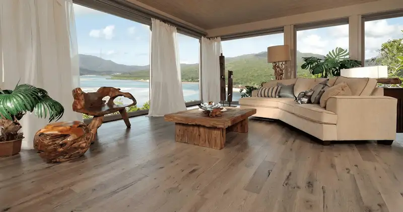 Professionally installed vinyl flooring in a modern living room with large windows in Rockford, IL